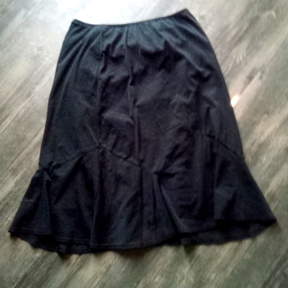 Sheer black mini skirt w polka dot detail and sheer lining.